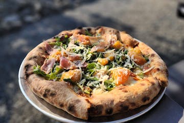 Farina Rossa Kitchen has been serving up pizzas like this Lucky Peach at pop-ups, but now it has a steady home in Northeast.
