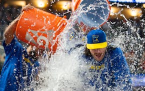 Twins pitcher Chris Paddack endures a celebration after his strong start Friday against the Giants.