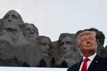 FILE - In this July 3, 2020, file photo, President Donald Trump stands at Mount Rushmore National Memorial, near Keystone, S.D. South Dakota Gov. Kris