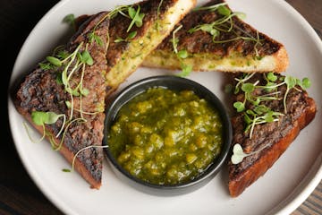 Yia Vang's Vinai in Minneapolis is a 2025 James Beard Foundation Awards semifinalist in the Best New Restaurant category. Pictured is the shrimp and p